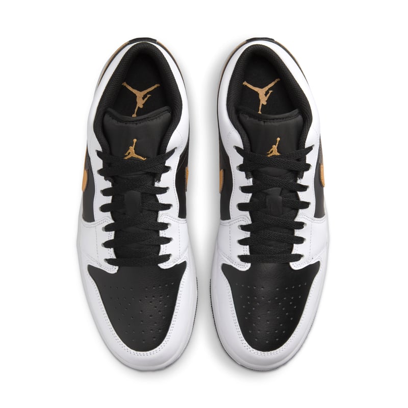 Tênis Nike Air Jordan 1 Baixo
Swoosh branco preto metálico